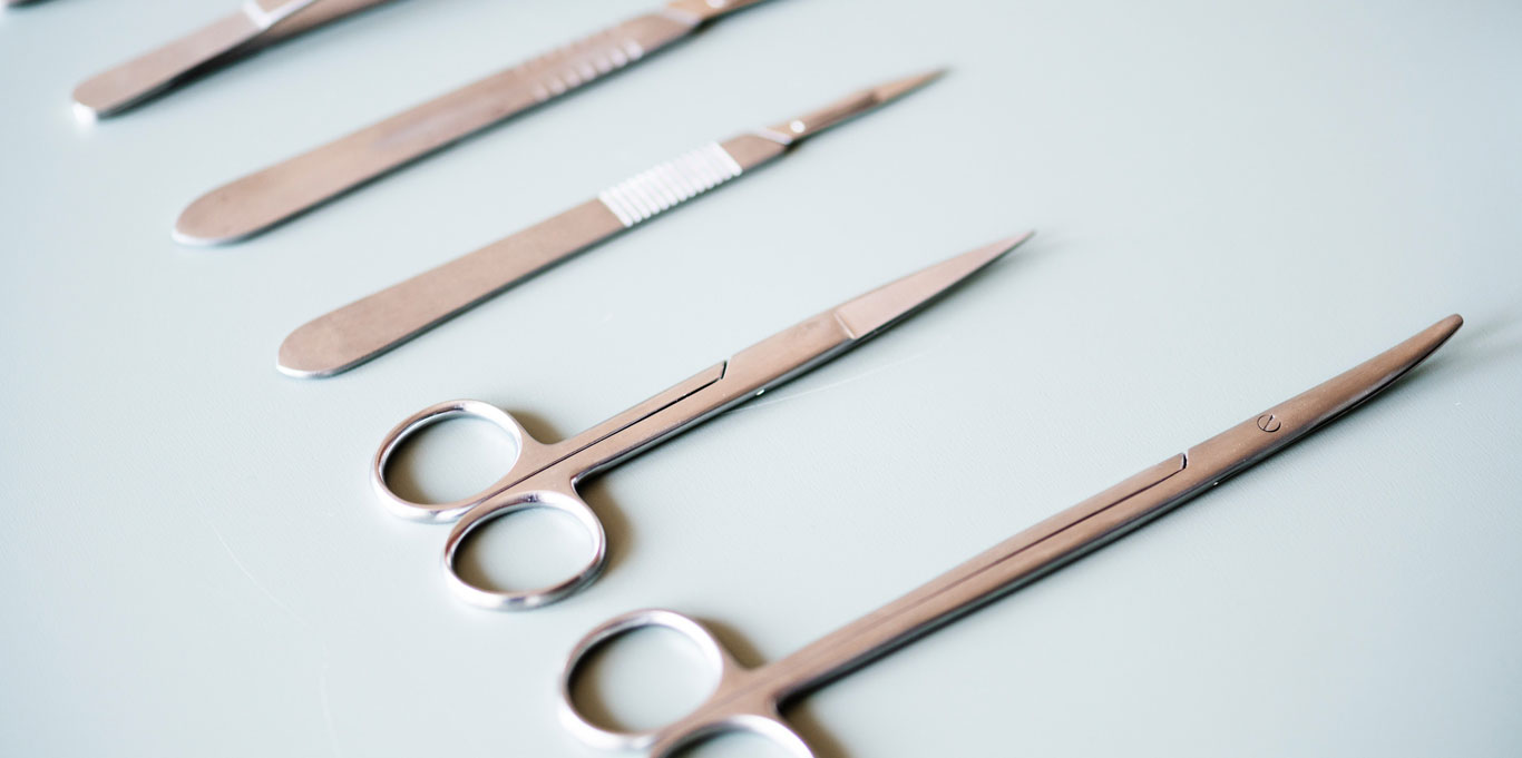Surgical instruments including scissors and scalpels