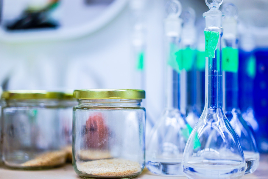 Flasks and bottles on a bench in a research laboratory