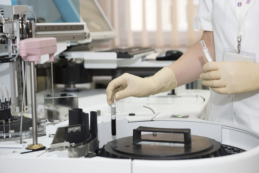 Lab technician running an experiment