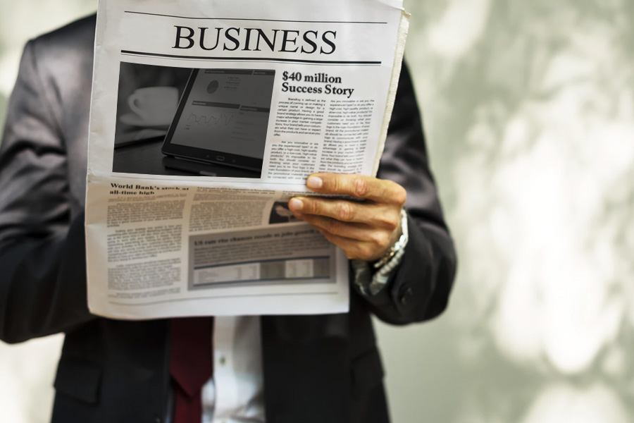Business news headline: $40 million Success Story.